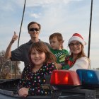 Volunteers Niko Valentino, Lauren Olson, Riley Giles and Talon Giles helped the Lemoore police and others deliver presents to local families as part of 'Presents on Patrol"